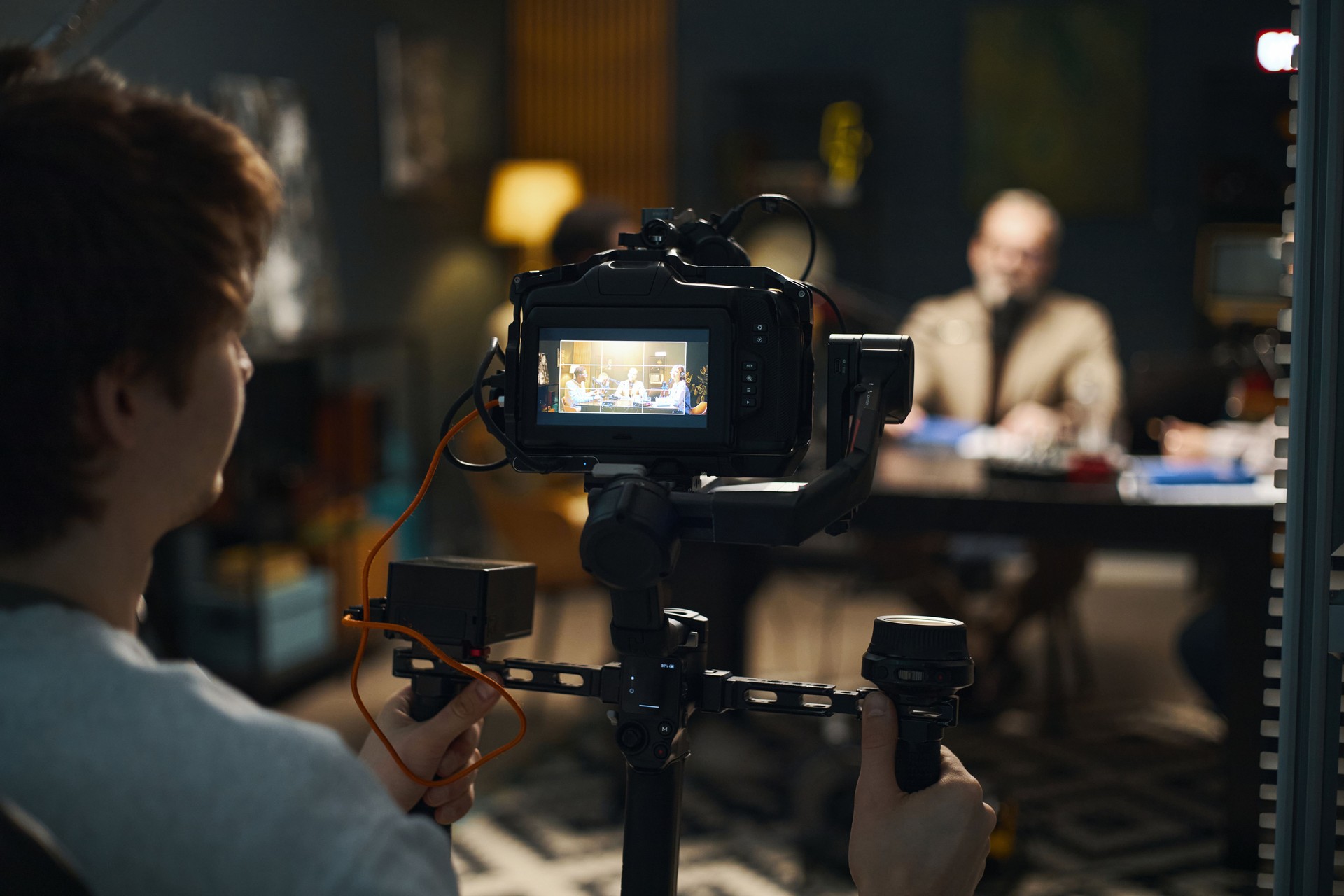 Operator Shooting Video Of Podcast